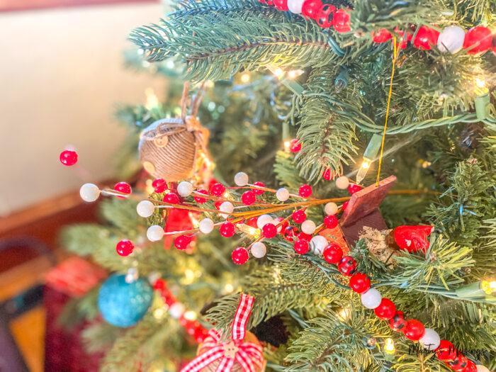 Red and white floral picks used on Christmas tree