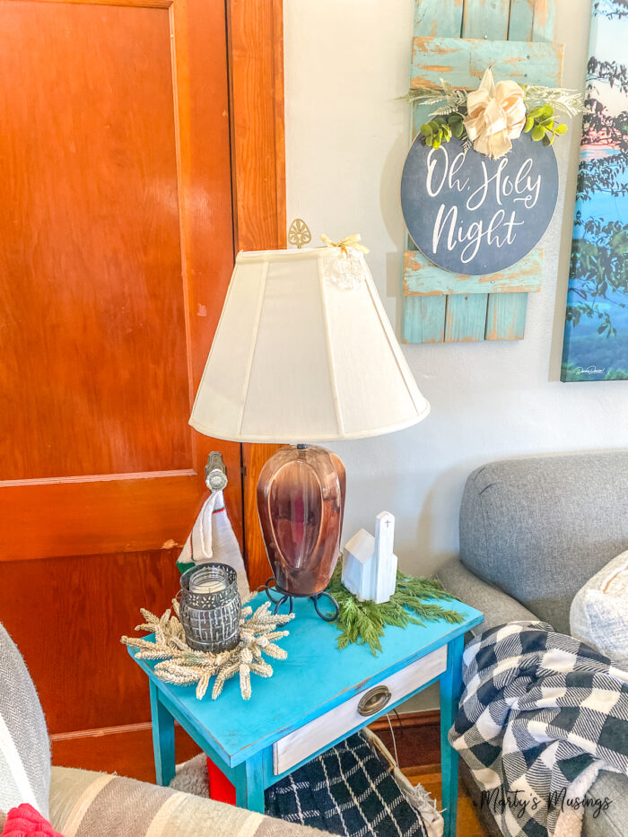 Vintage brown lamp on top of blue side table