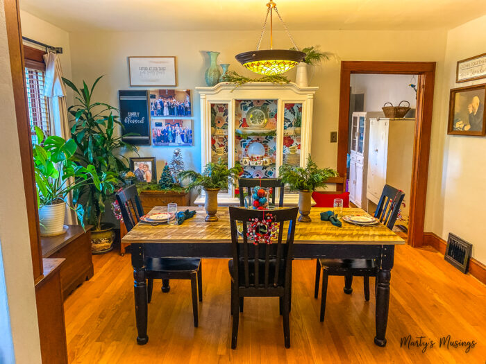 Craftsman home decorated for Christmas with greenery and vintage decorations