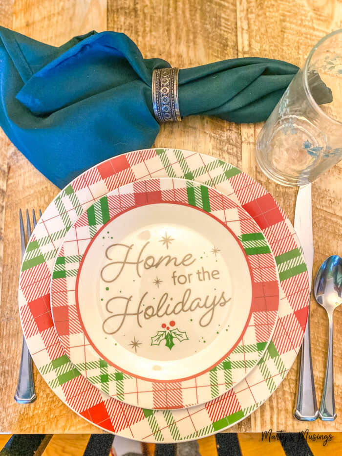 Home for the holidays buffalo plaid plates at Christmas table